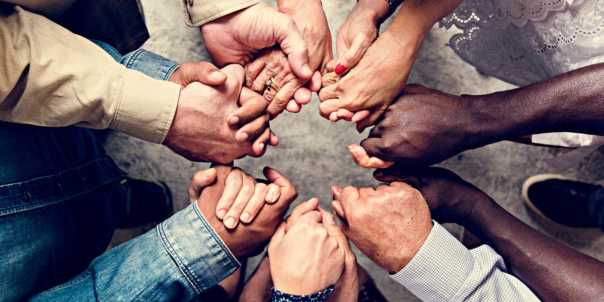 Reasons to join a grief support group hands join into a supportive circle