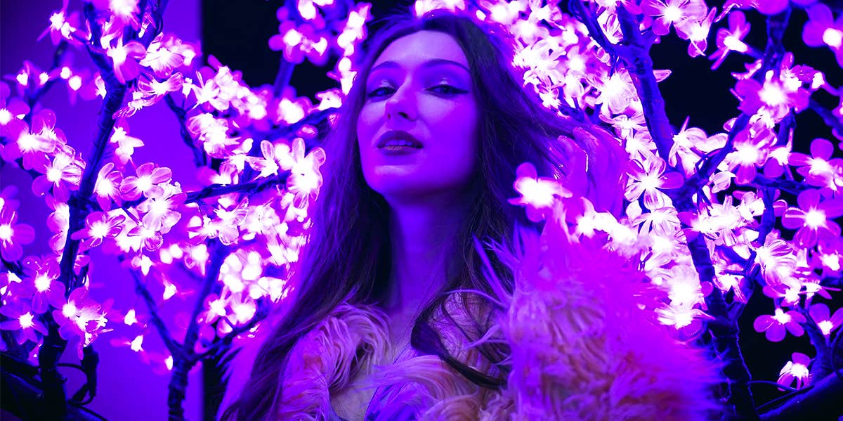5 Rare Habits Of People Who Are True Originals girl in purple neon lights
