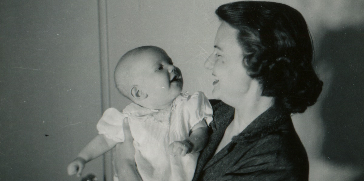 vintage photo of mother holding baby