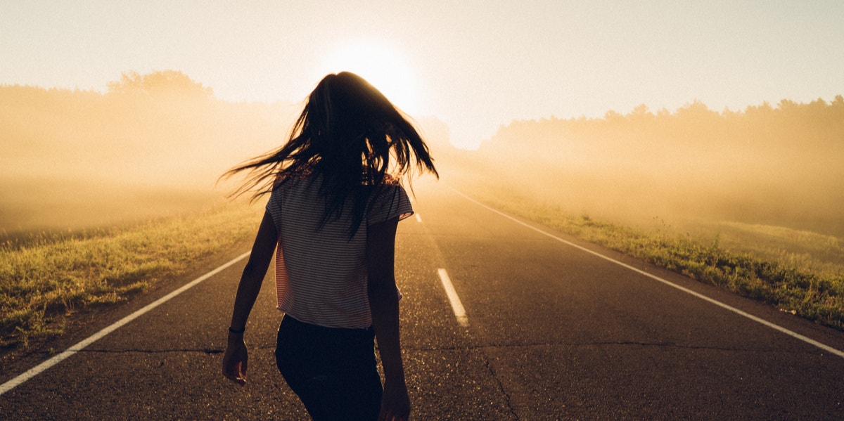 woman walking down street