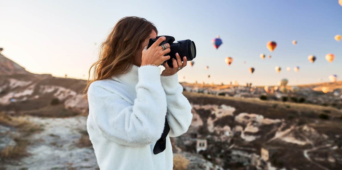 woman behind camera