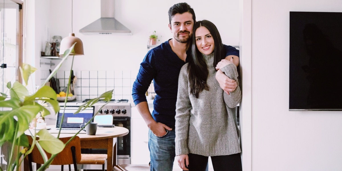 talking about marriage and money couple in a new home