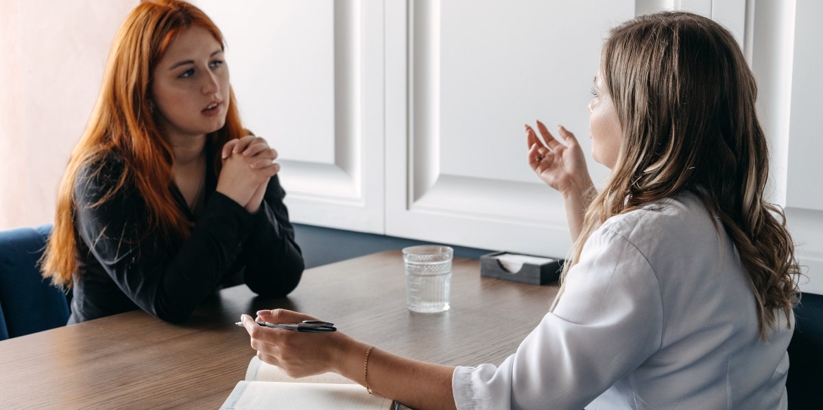woman talking to a therapist