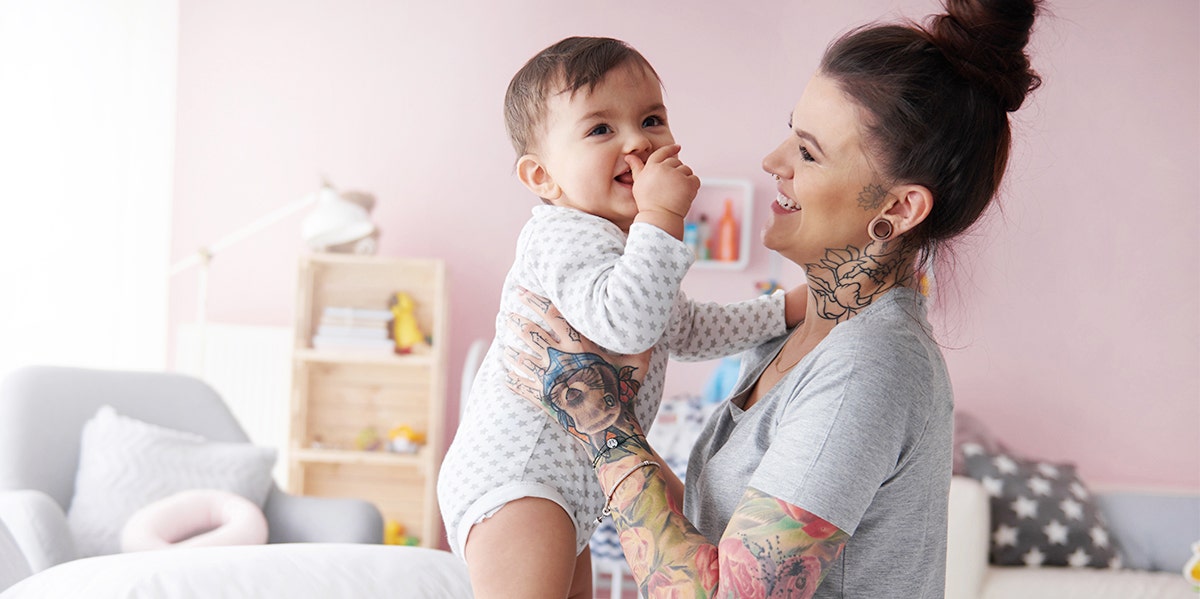 woman holding baby