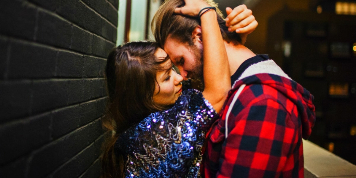 man and woman about to kiss