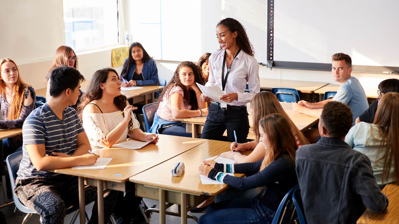 Teacher talking to students