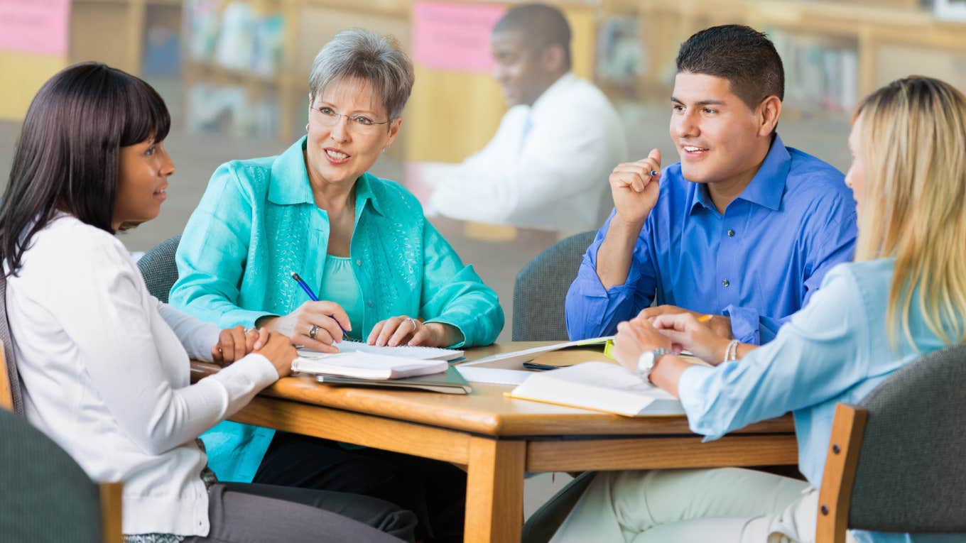 Teachers talking while at a meeting