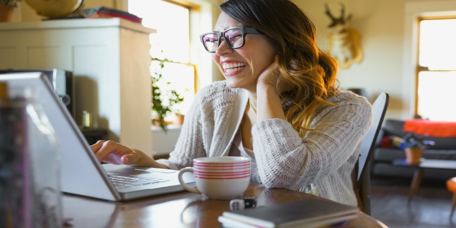 woman looking at computer