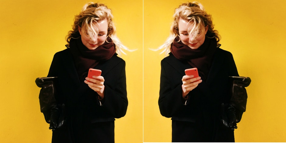 The Crazy Lesson I Learned From Going On 80 First Dates woman looking at phone