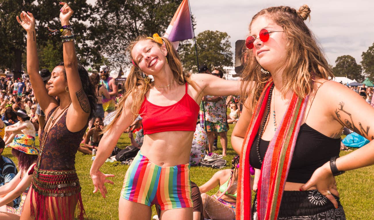 queer teenagers standing in a field