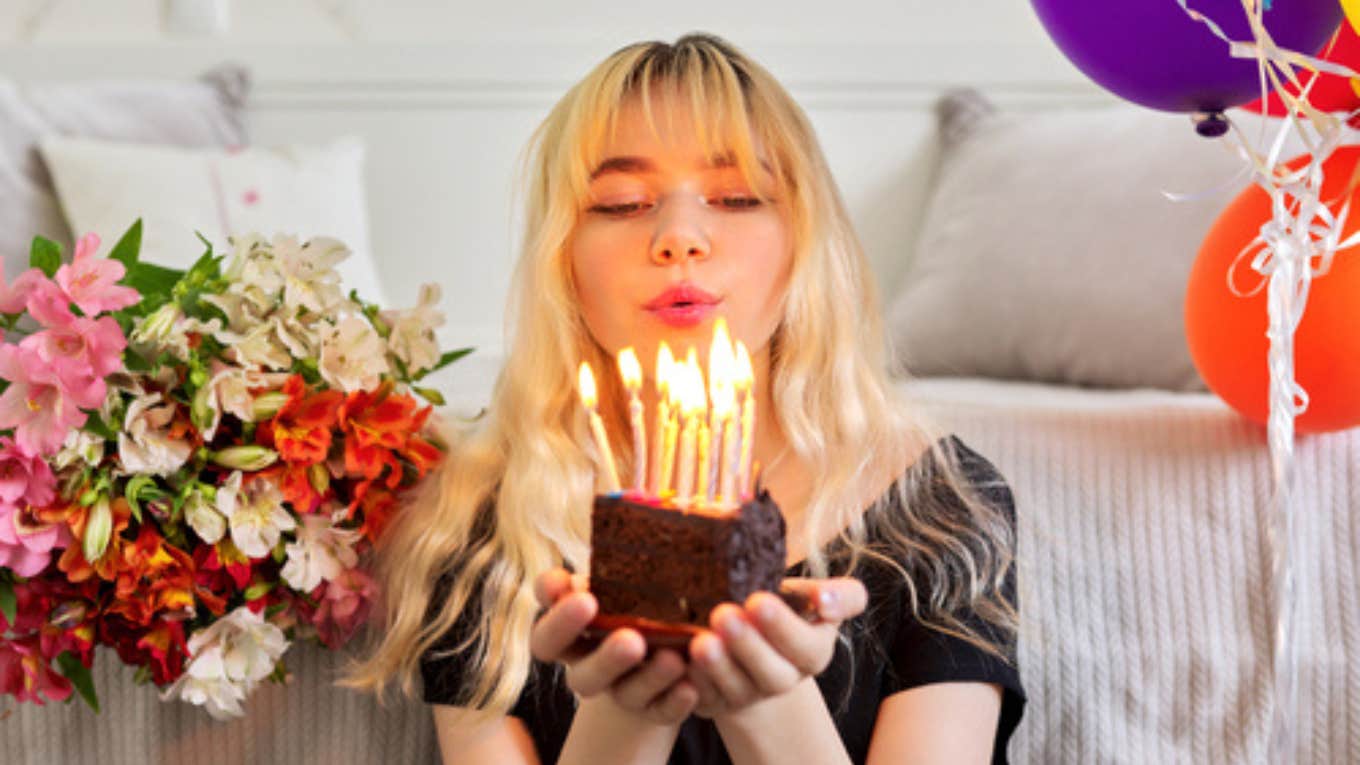 teenager, blowing candles