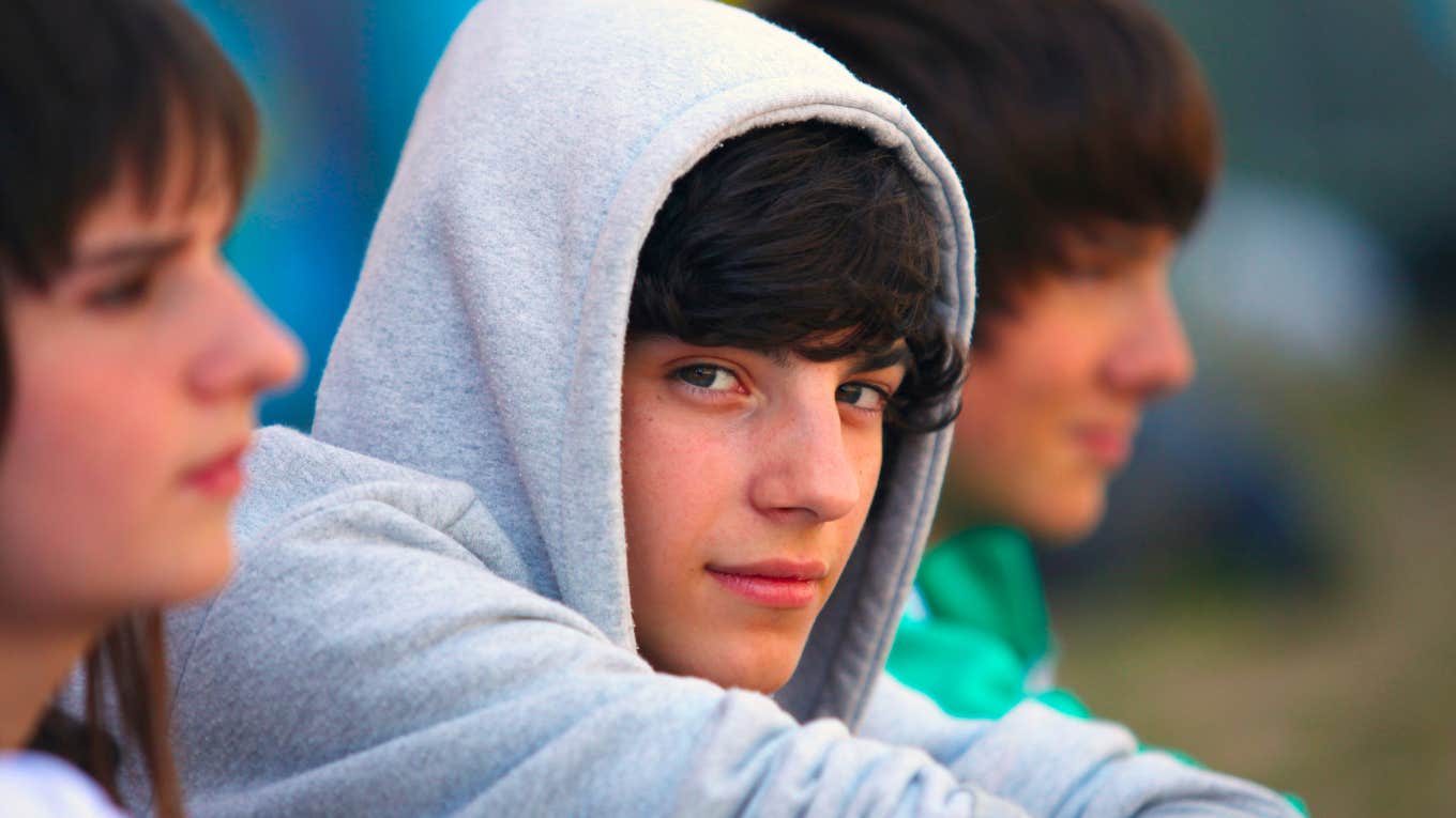 teenager wearing a hoodie