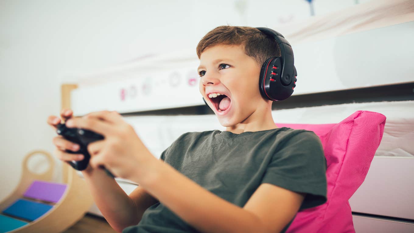 boy playing video game