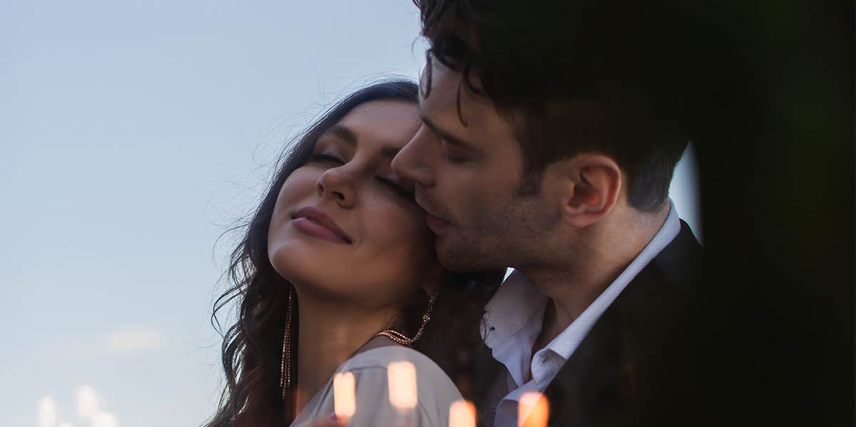10 Things You'll Never Worry About If He Really, Truly Loves You man hugging woman from behind