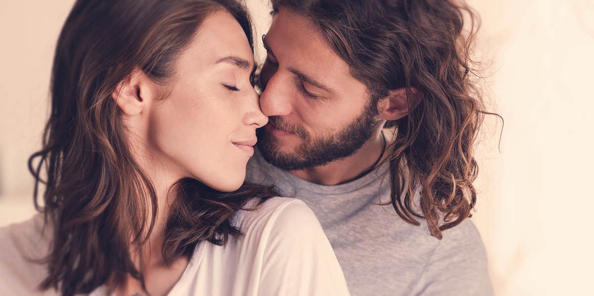The 3 Secrets For Getting Your Man To Give A Damn About Your Relationship couple kissing
