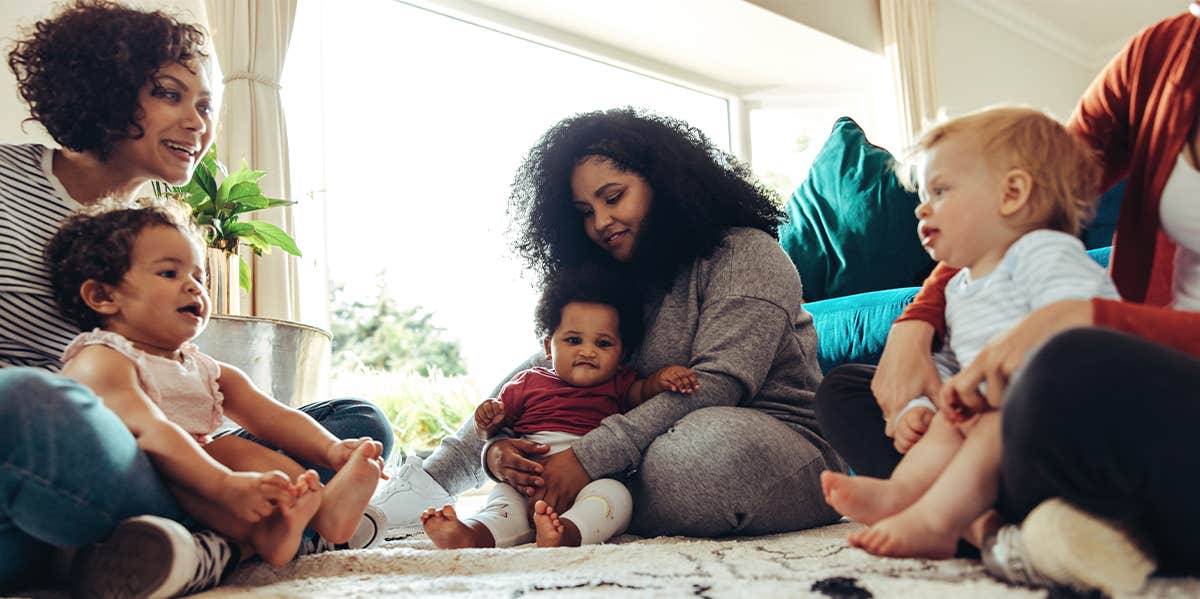 group of mothers with their babies