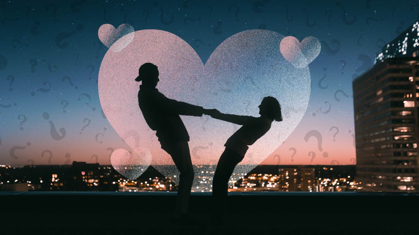 silhouette of man and woman holding hands at night