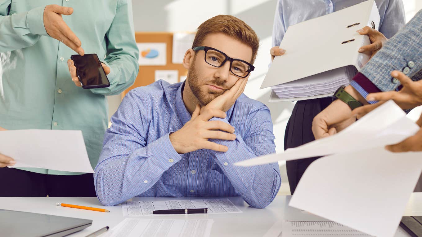 Man looking unfocused while at work. 