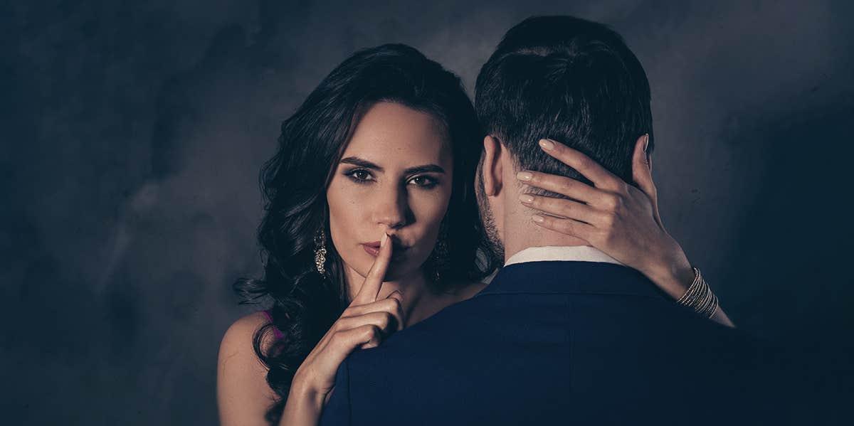 The Real Reason Women Don't Want A Nice Guy woman and man hugging