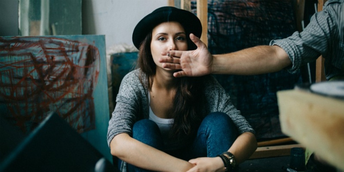 This Is The Side Of Emotional Abuse You Don't See man holding out cigarette woman smoking it