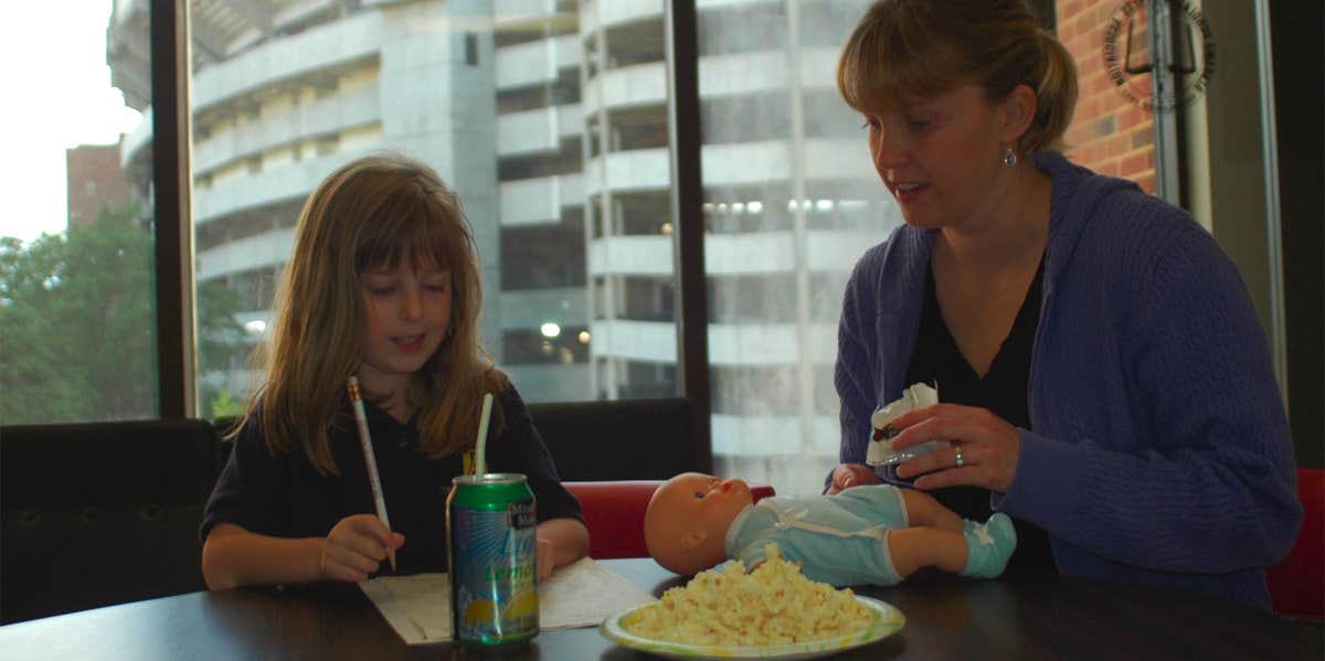 When my daughter was younger, after school I would often take her back to work with me (just by Bryant-Denny Stadium, in the back). Snack and homework time while juggling work was our daily routine.