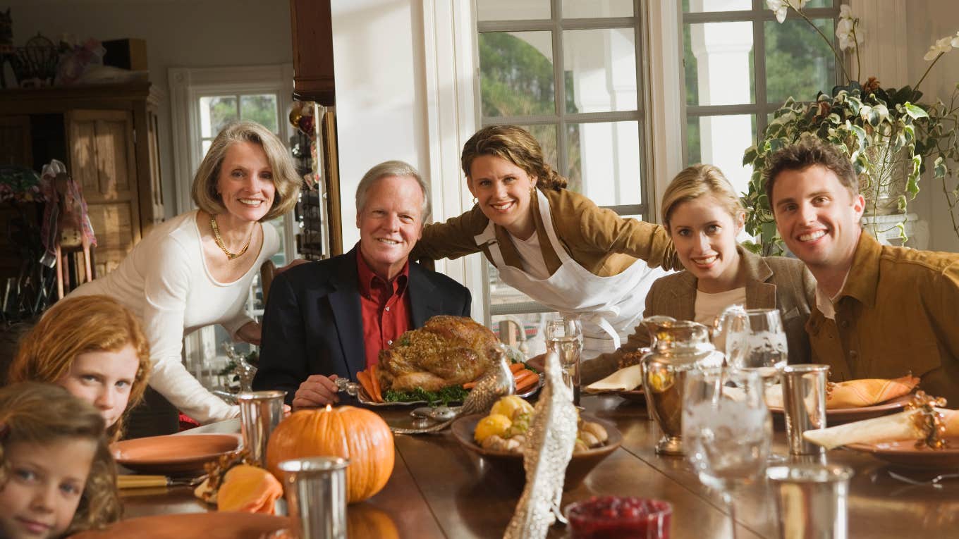 Therapist Shares Eight Phrases To Say During The Holidays To Hold Your Boundaries With Family family gathered together for Thanksgiving