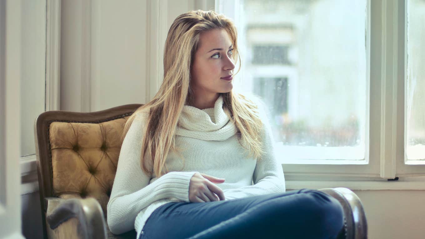 woman sitting in a chair 