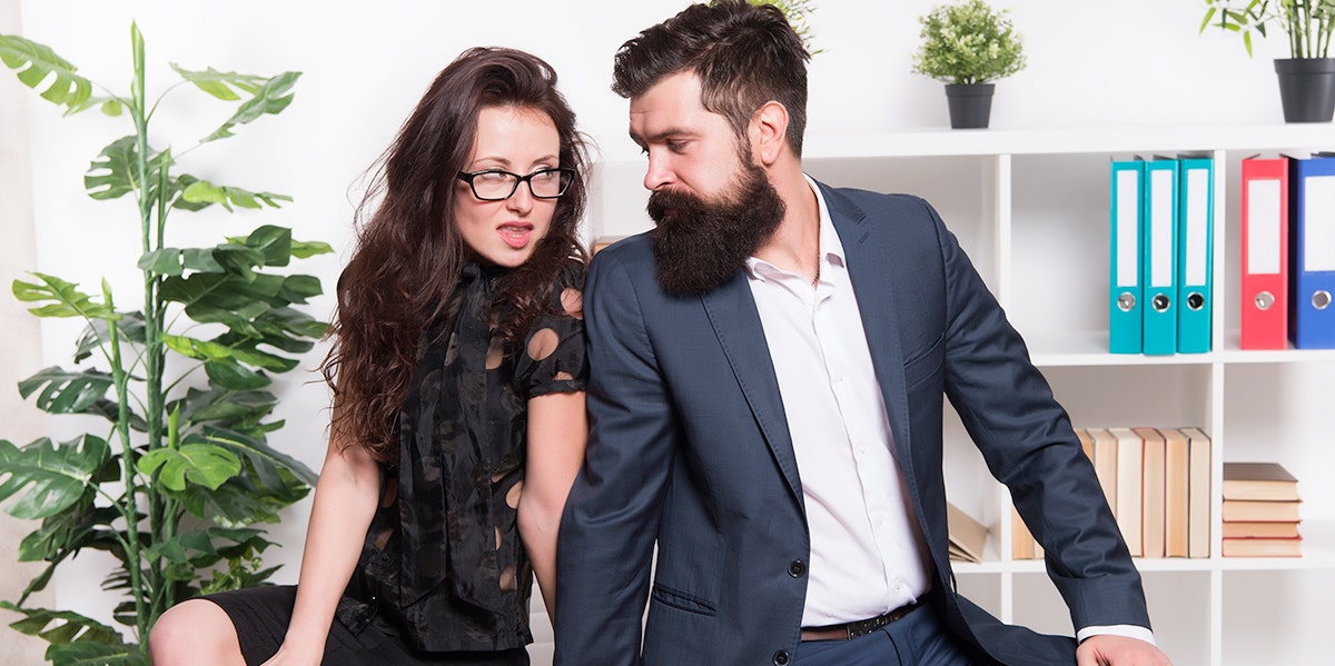 woman looking seductively at man with beard