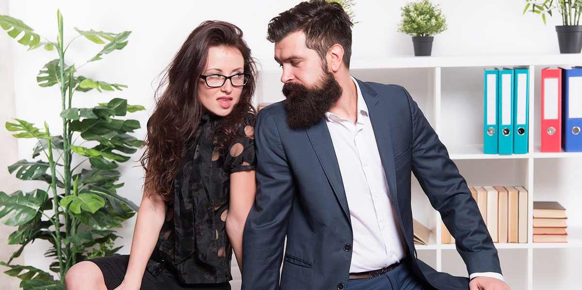Cuddling Therapist Faces Sexual Misconduct Charges After Her Nipple Ended Up In Client's Mouth woman looking seductively at man with beard