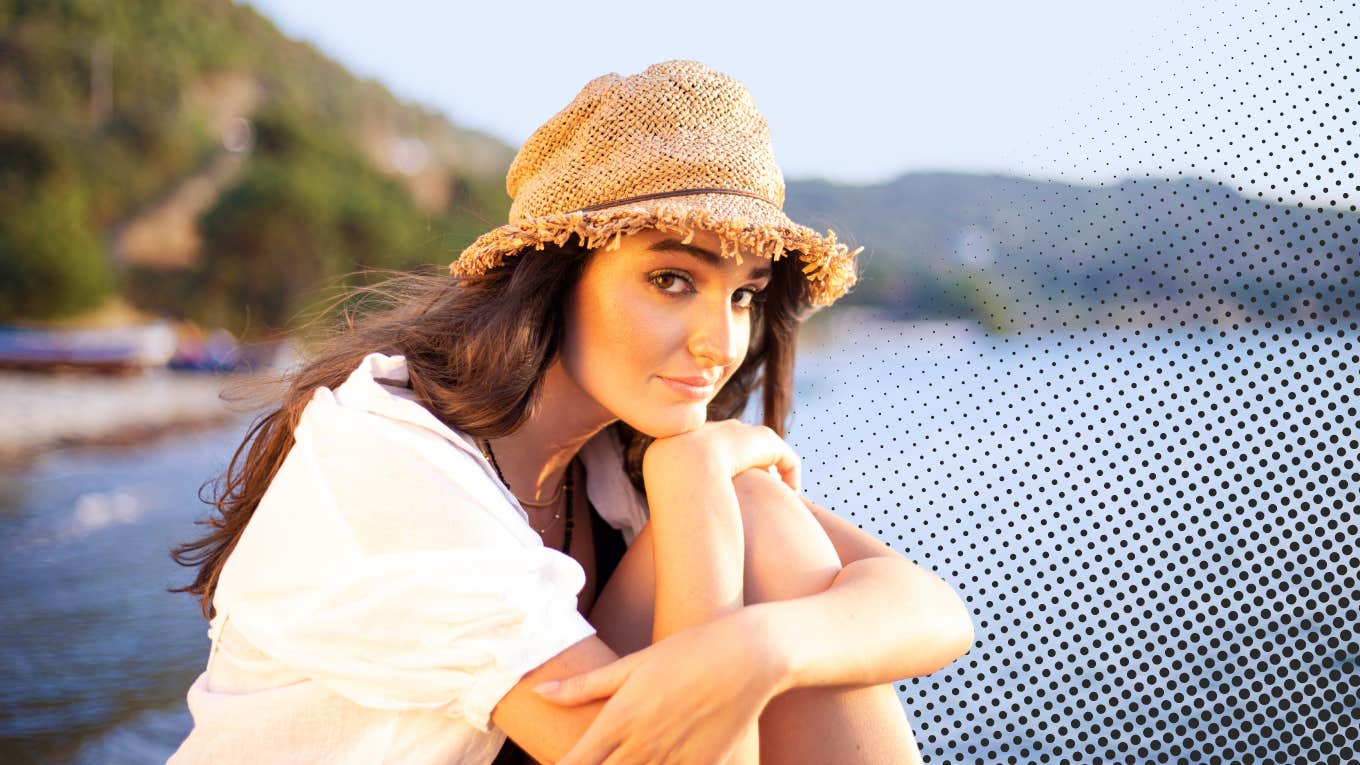 woman at lake looking thoughtful