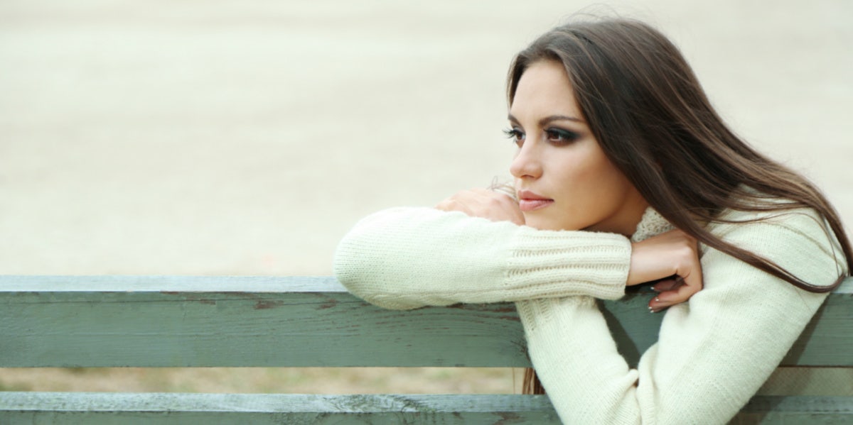 Woman sitting on bench 