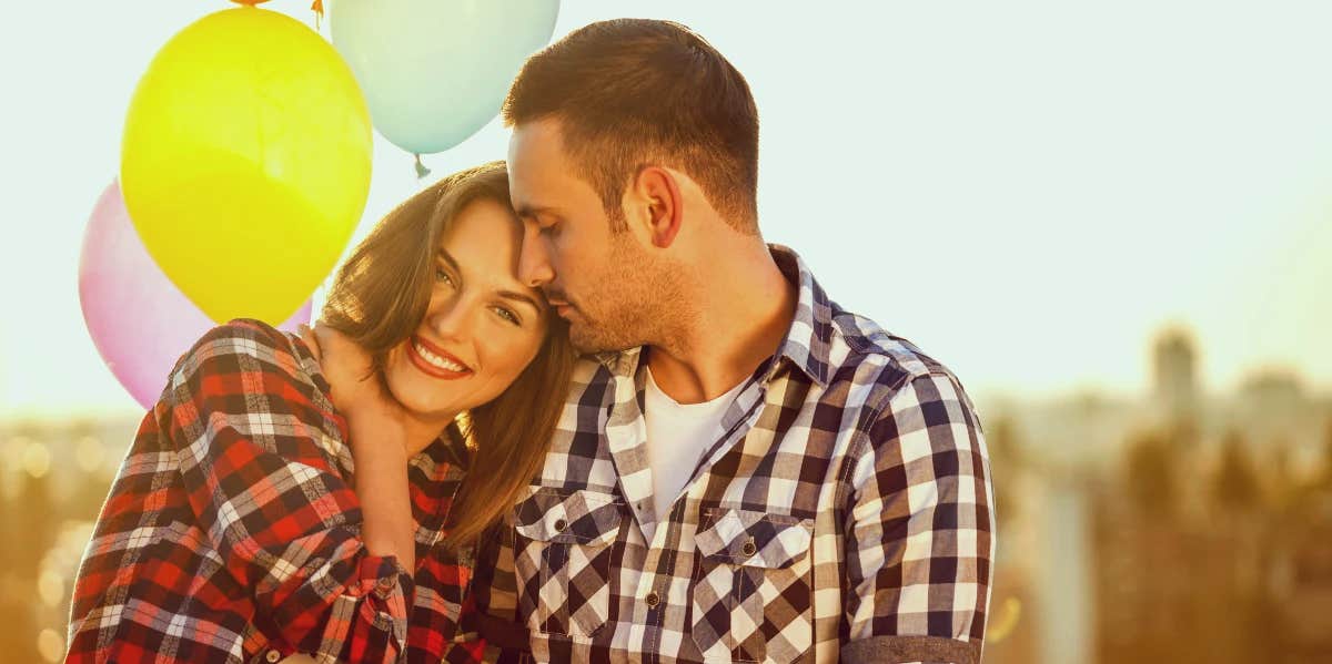 happy couple with balloons