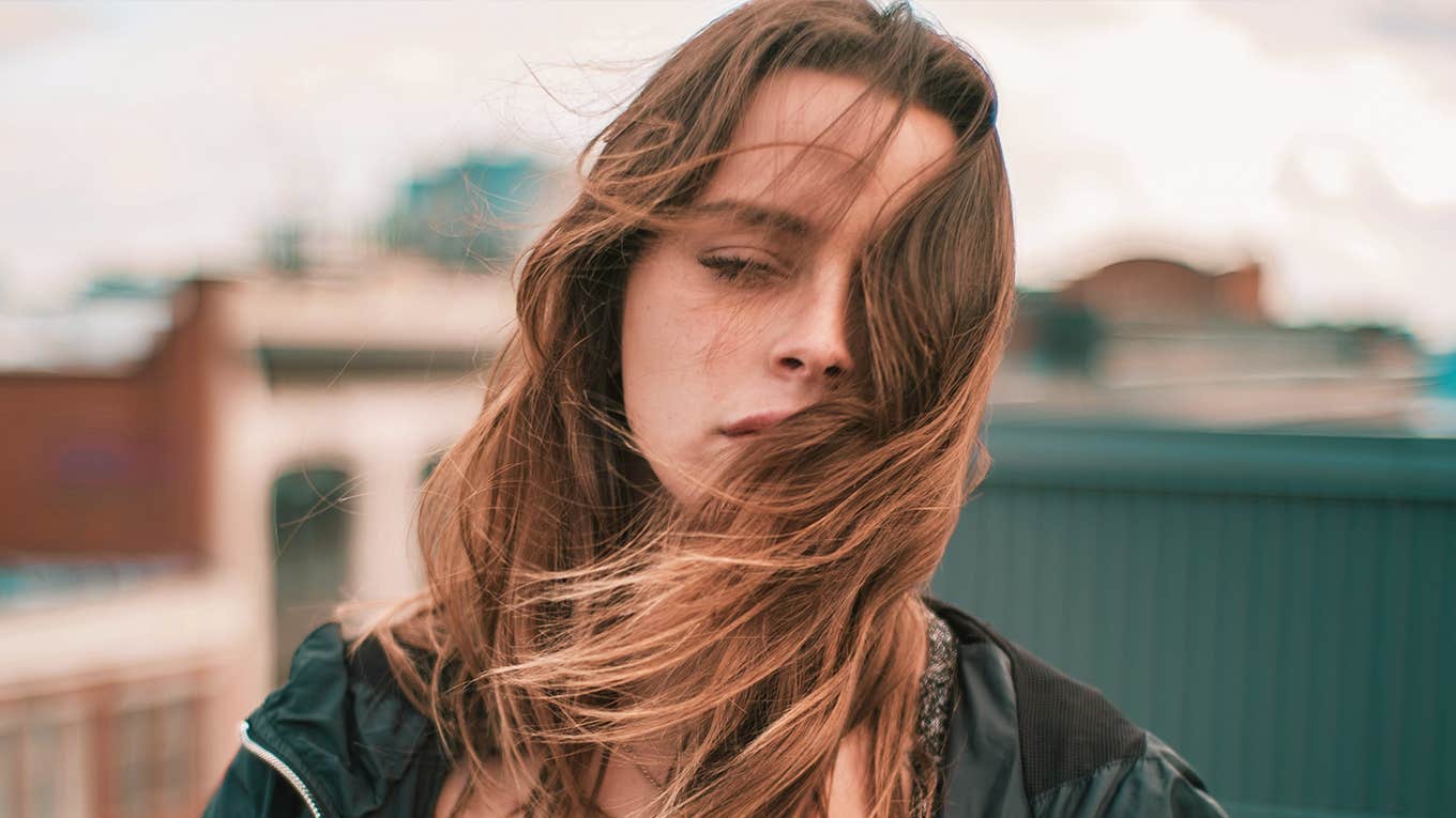 6 Urgent Things To Do When Depression Hits So Hard You Can't Get Out Of Bed sad woman closing her eyes