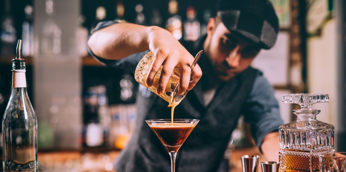 bartender pouring drinks