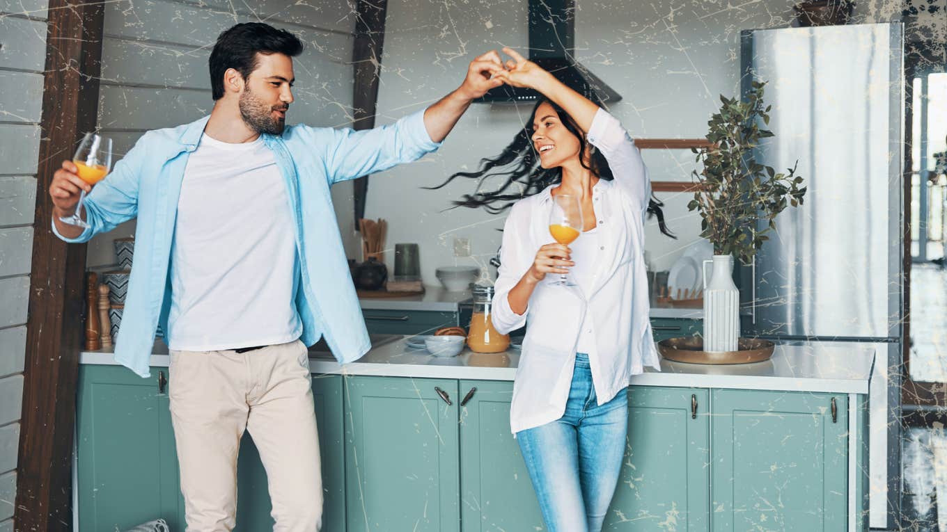 Couple dancing in their kitchen 