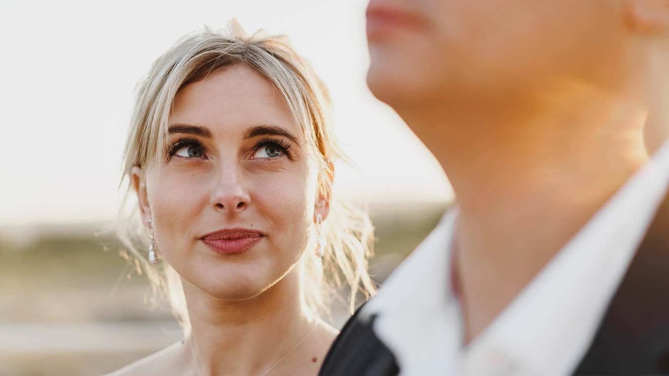 woman looking up at man