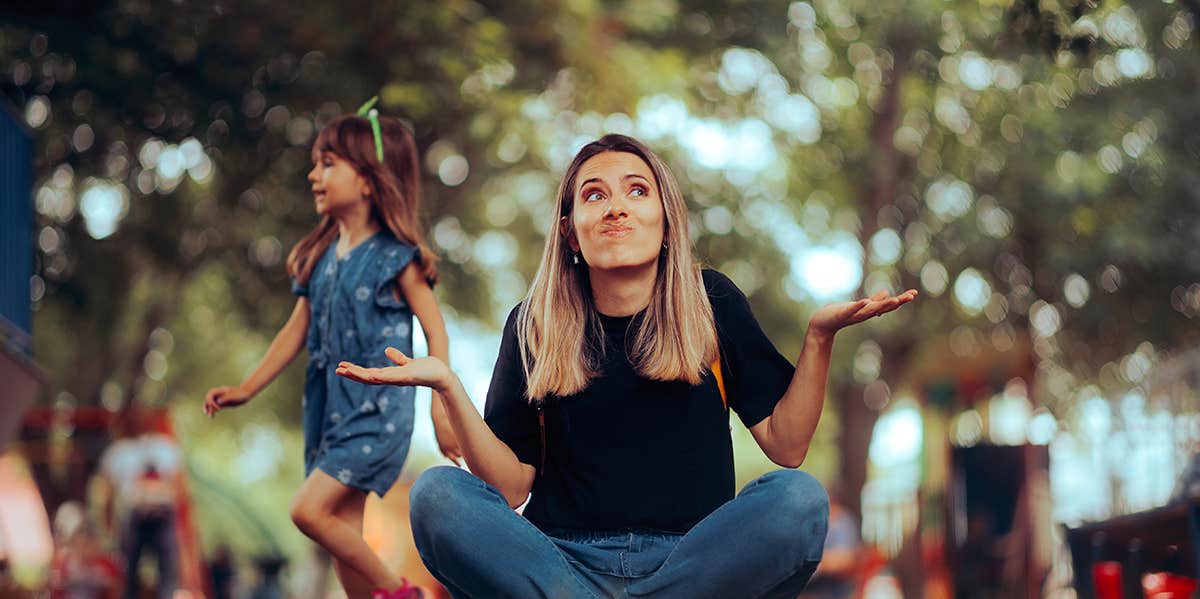 woman gesturing that she doesn't know something