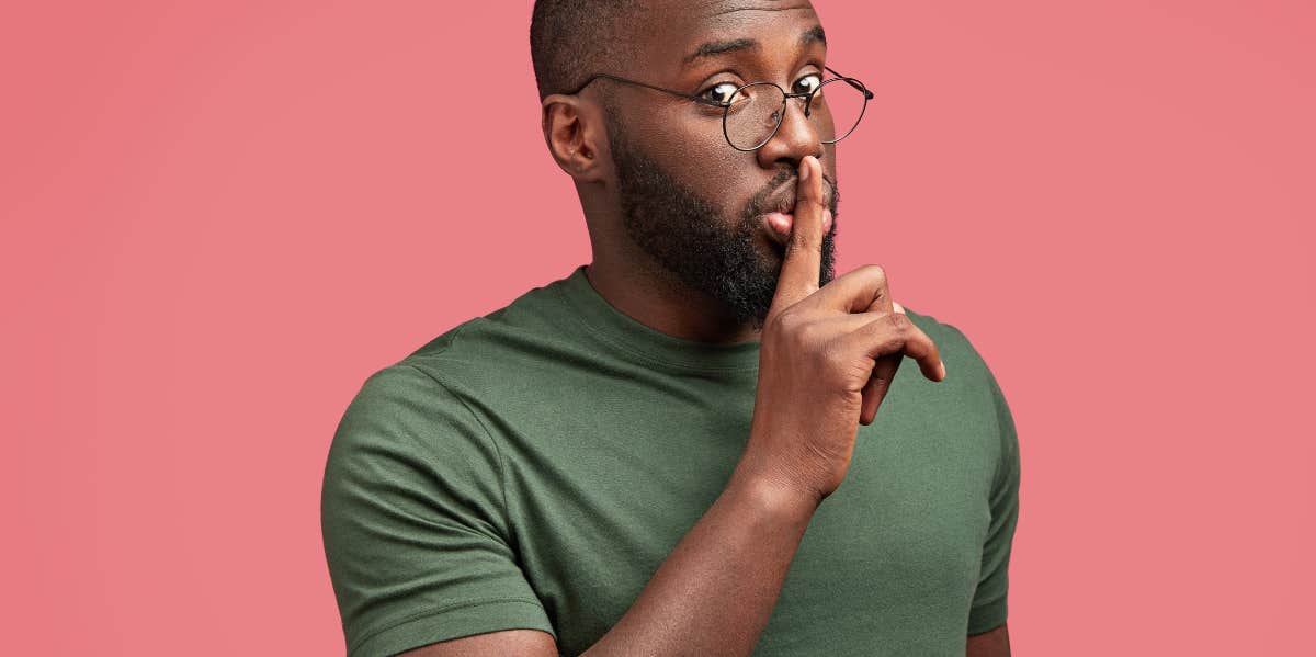 10 Things Men Hide From Women (That Make Us Love Them More) man hiding something