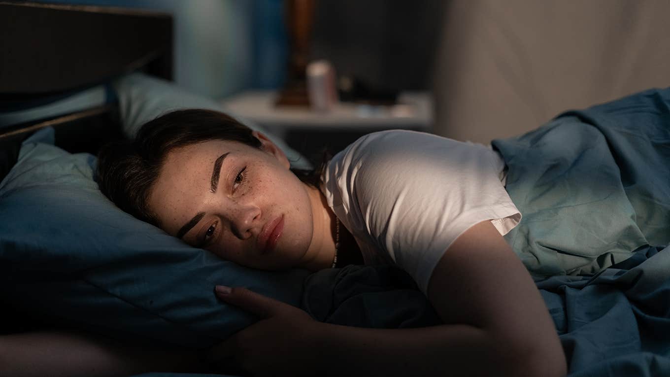 Things To Never, Ever Say To The Woman You Love (Unless You Want A Divorce) sad woman laying alone in bed