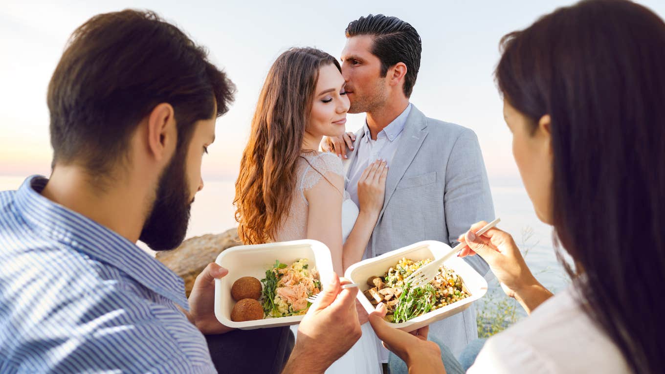 couple staying in eating takeout