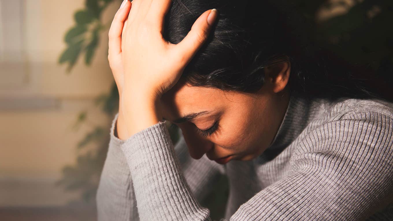 11 Tiny Things To Stop Doing If You’re Trying To Manage Depression unhappy woman holding head in hands