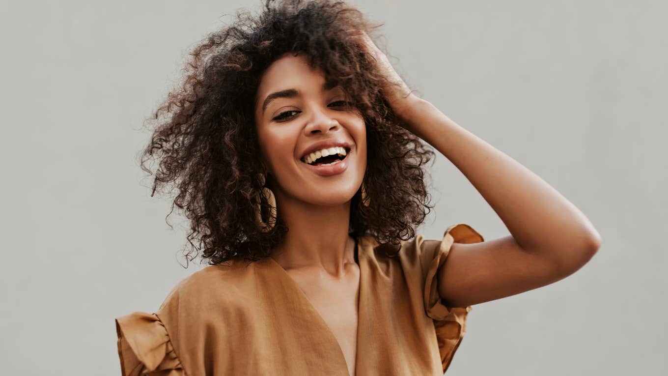 strong woman with curly hair