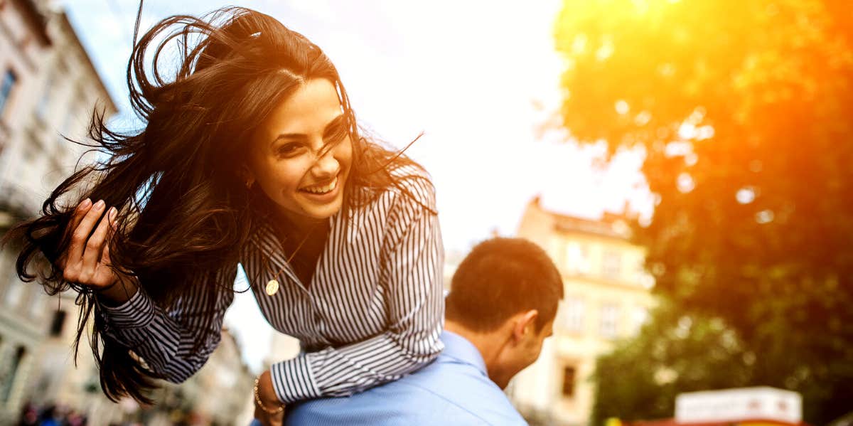 couples having fun walking through town