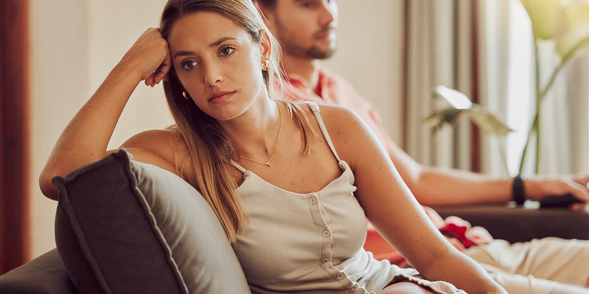 woman looking away from husband exasperated