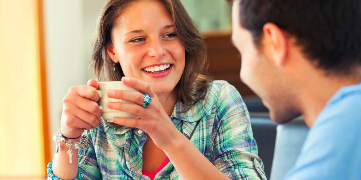 woman talking to man over coffee