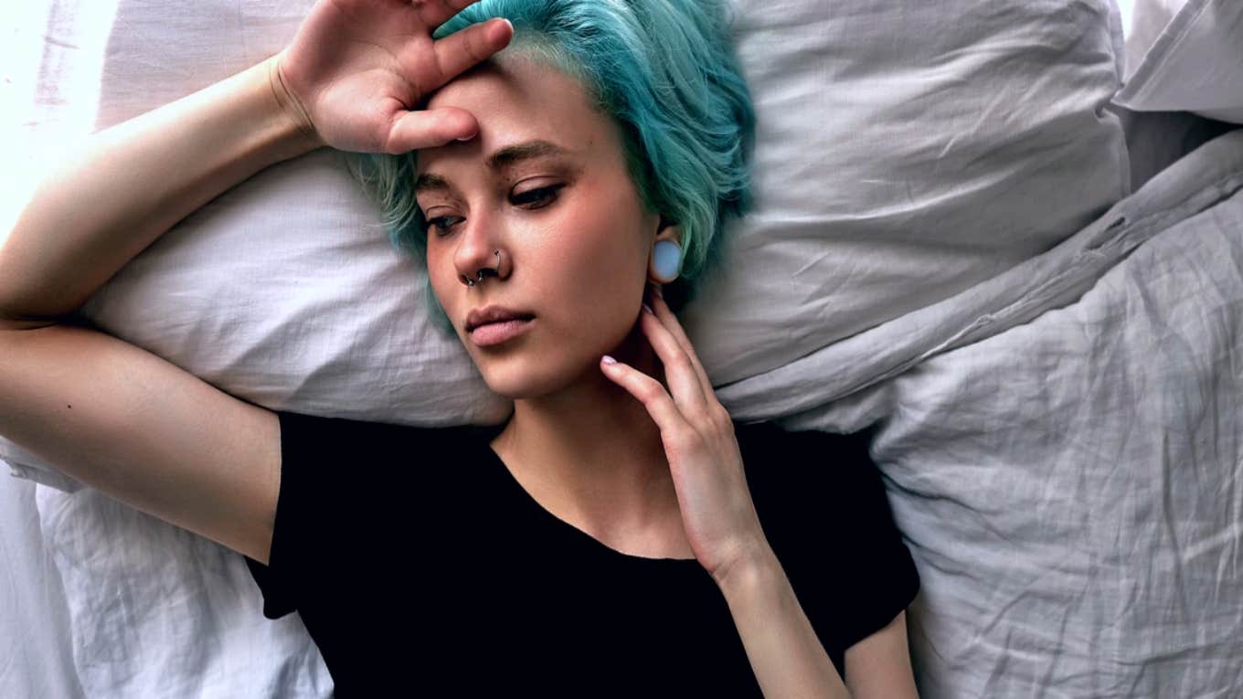 sad woman with blue hair