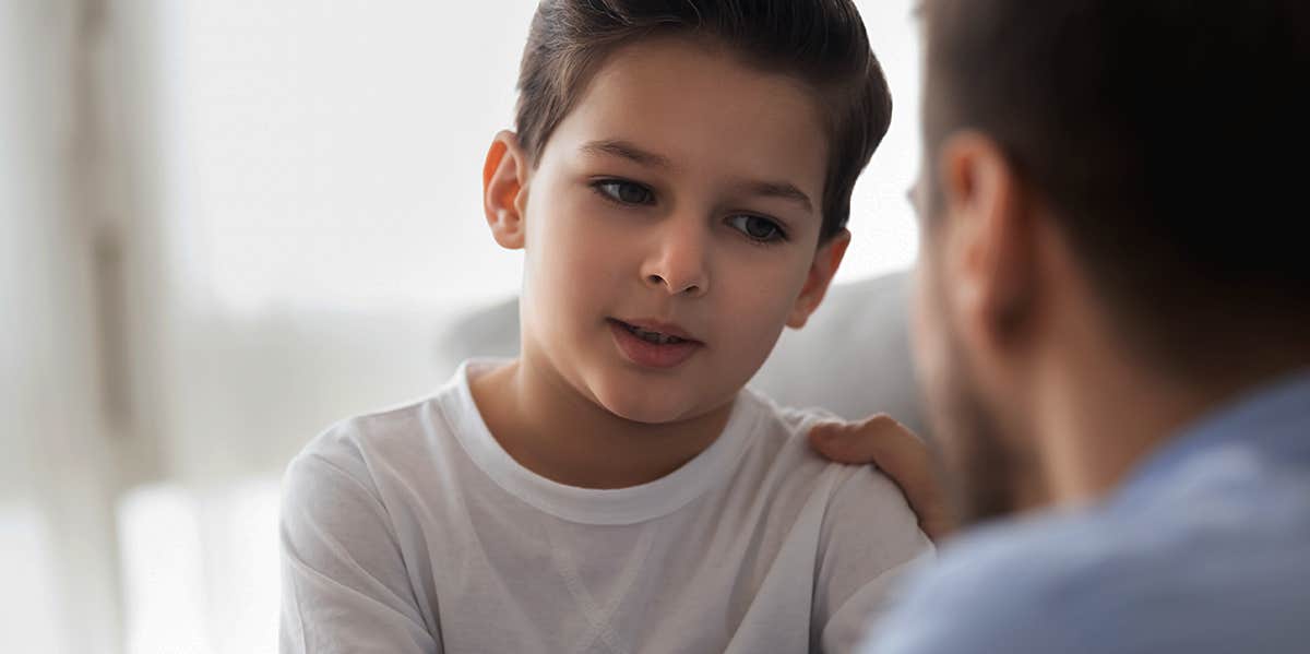 Dad having talk with son