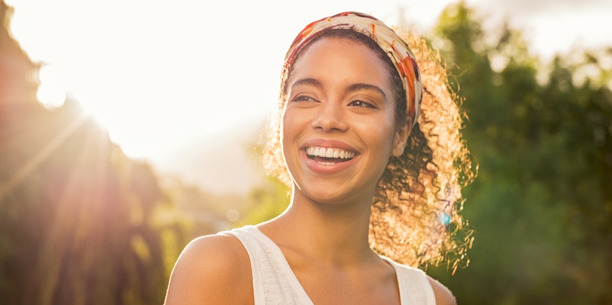 10 Things You're Doing Because You're Finally Starting To Love Yourself happy woman in sunlight