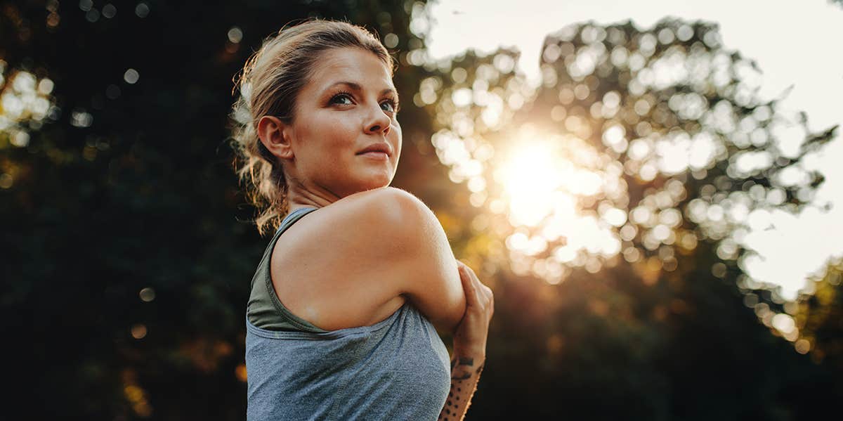 fit woman stretching