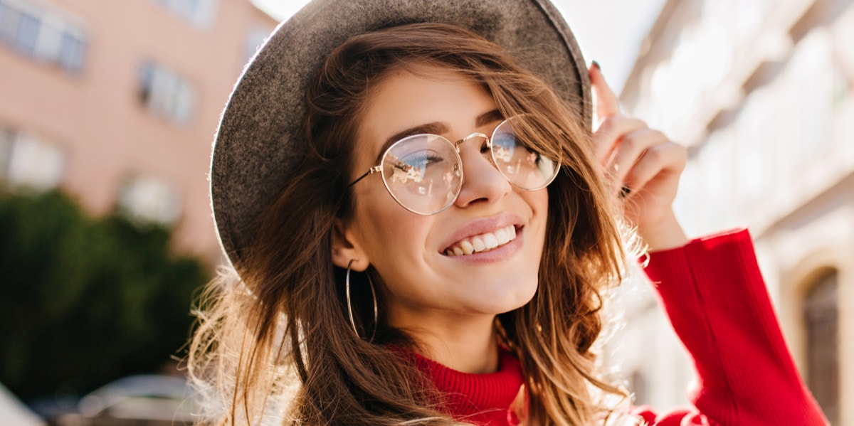 5 Thoughts That Can Get You Through (Almost) Anything woman smiling with glasses on